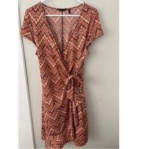 Women's Flattering Sofia Vegara Orange wrap dress size large